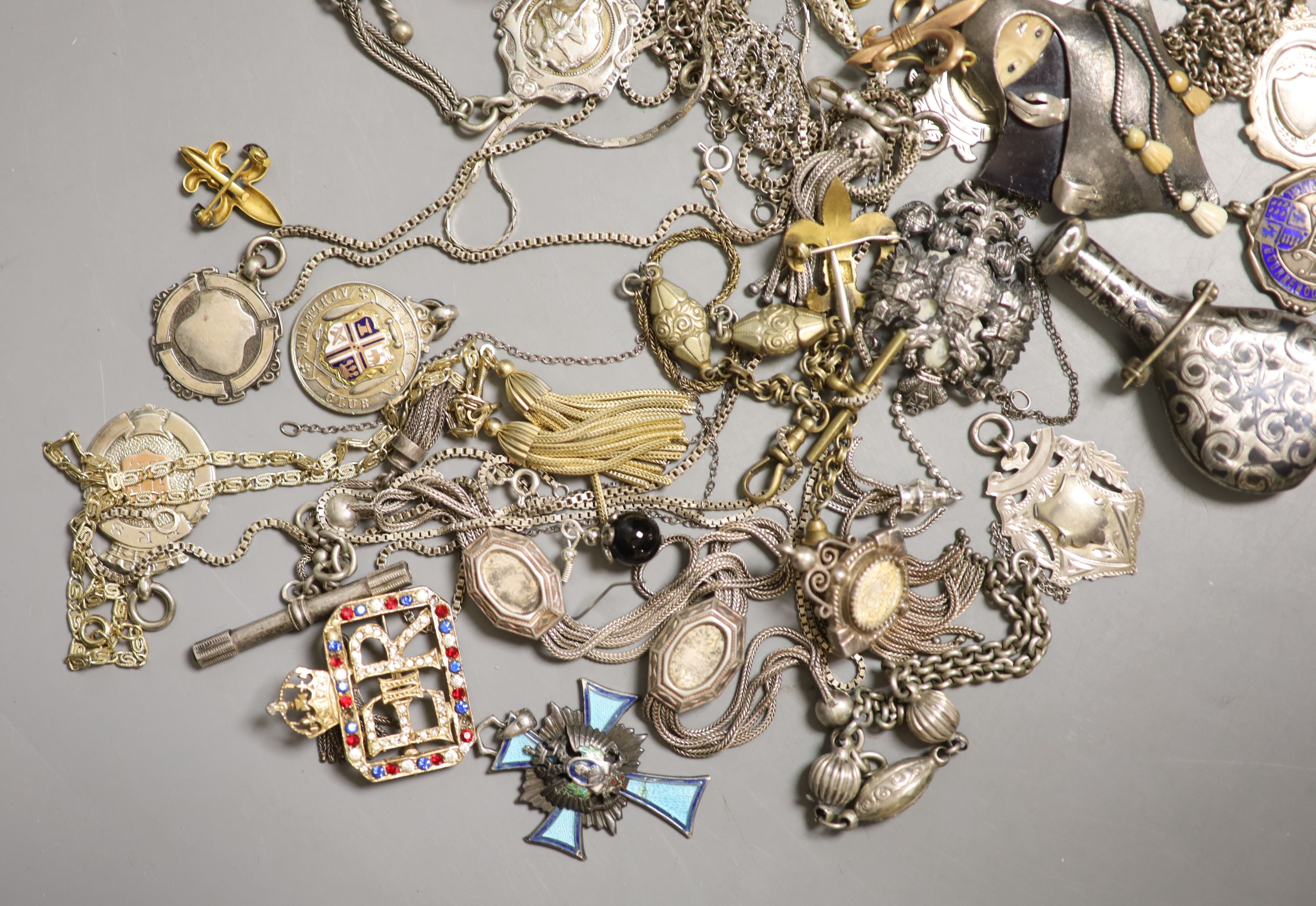 A quantity of assorted jewellery etc. including 925 chains, silver medallions, white metal albertinas, brooches and necklaces.